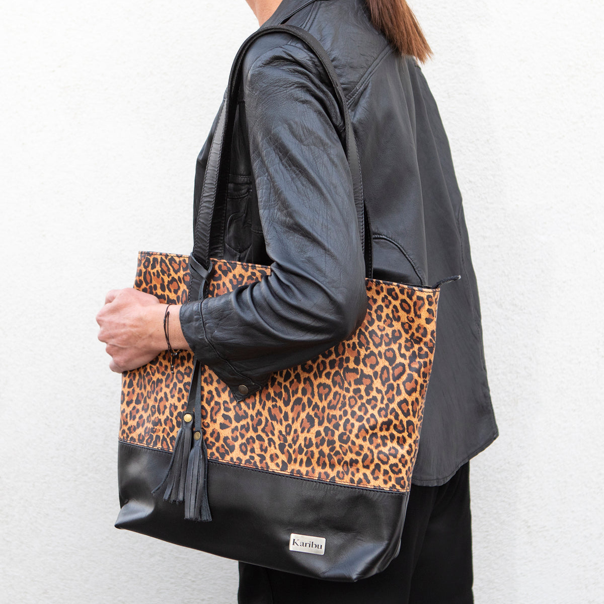 Cartera Victoria Animal print con negro