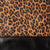 Cartera Victoria Animal print con negro